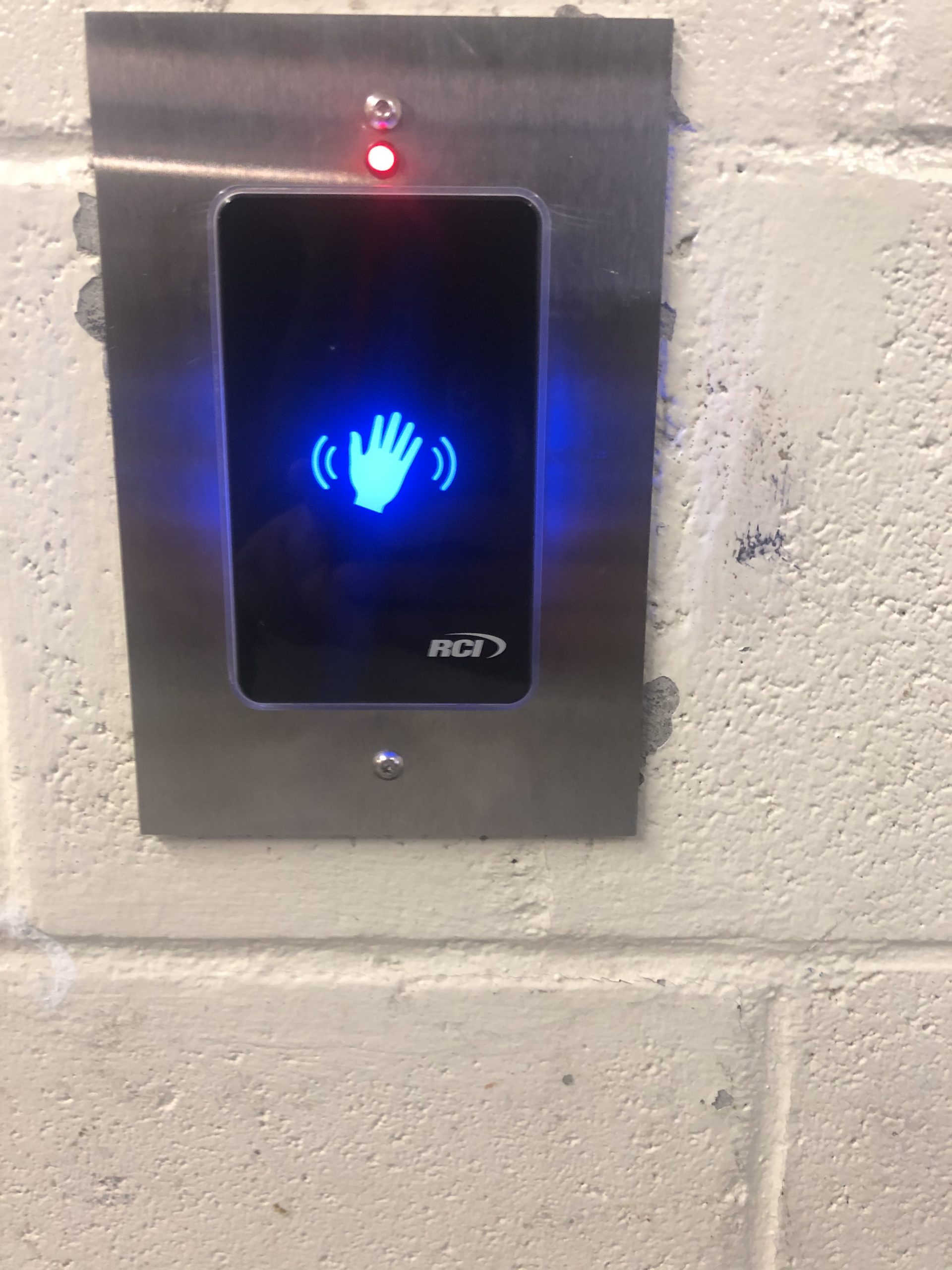 A touchless elevator button.